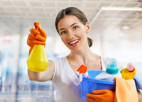Professional cleaning team preparing a service agreement for a UK property